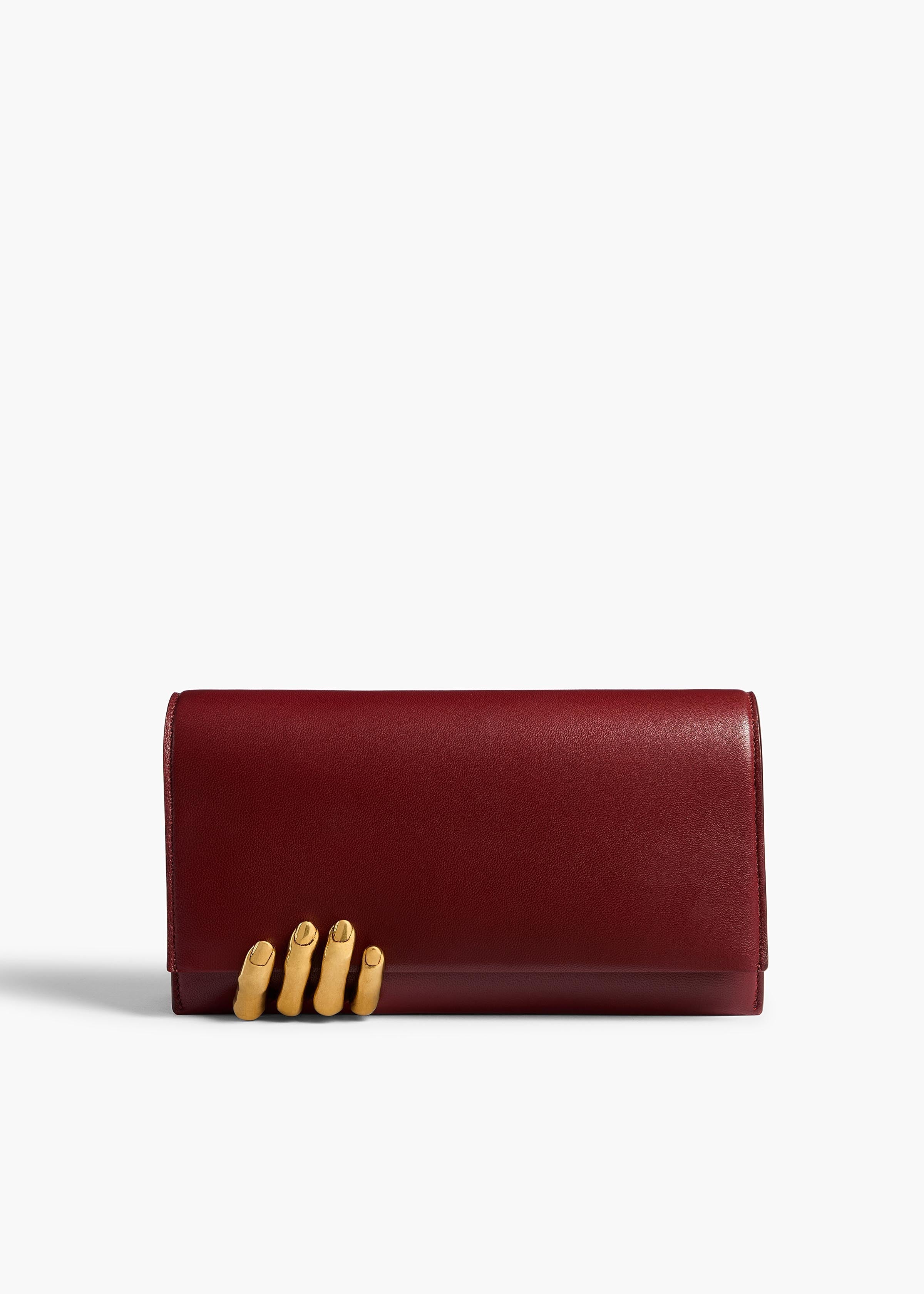 Khaite - Sculpted Hand Clutch in Oxblood Leather