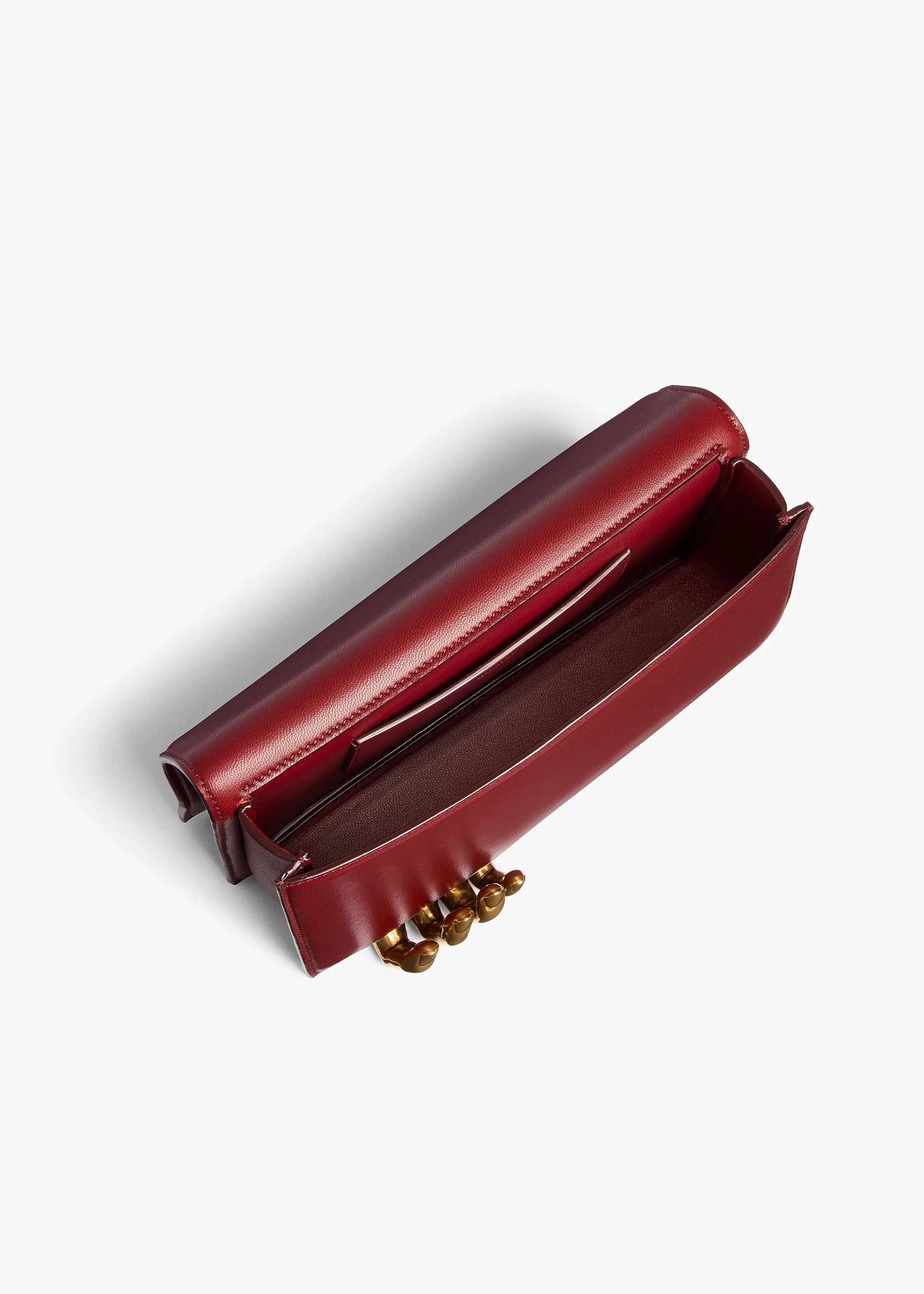 Khaite - Sculpted Hand Clutch in Oxblood Leather - Image 3